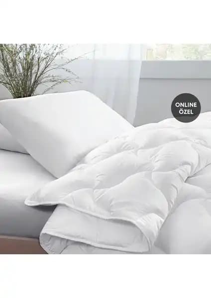 Yataş Bedding Tek Kişilik Yorgan Karşılaştırması: Eco Night ve Macaron Wellsoft Modelleri 1