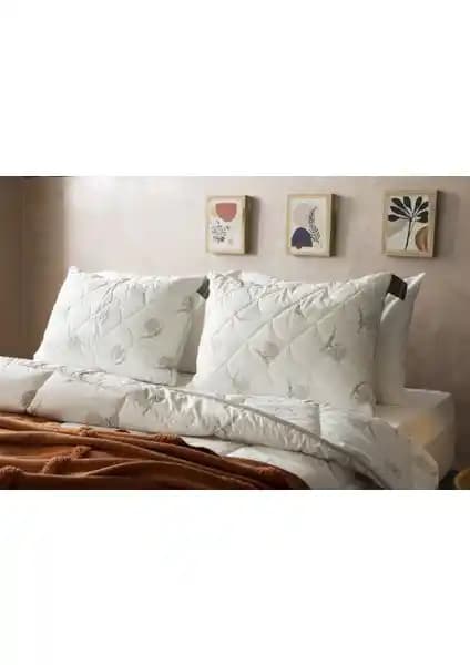 Duvetta Kapitone Yün Boncuk Yastık: Sağlıklı ve Konforlu Uyku İçin Doğal Seçenek