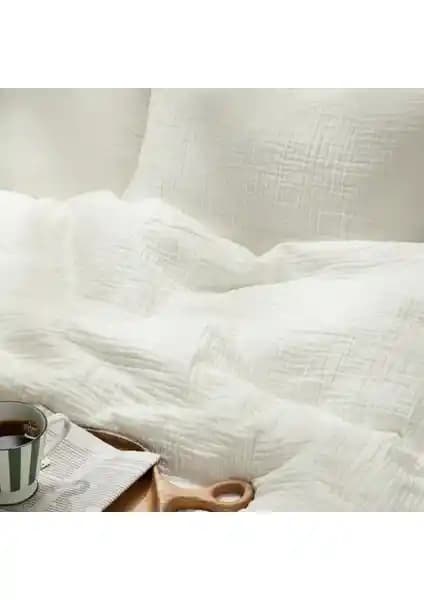 Gine Teks 4 Kat Müslin Yatak Örtüsü ve TV Battaniyesi: Sağlıklı ve Şık Tasarım